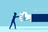 Vector of a woman fighting back a giant fist, protecting herself from work abuse or domestic violence.